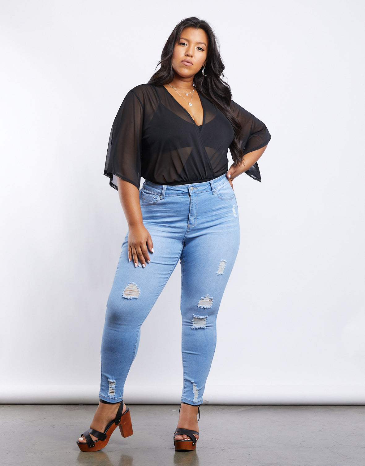 http://www.2020ave.com/cdn/shop/products/Plus_Size_Lilia_Ripped_Jeans_1.jpg?v=1617181390